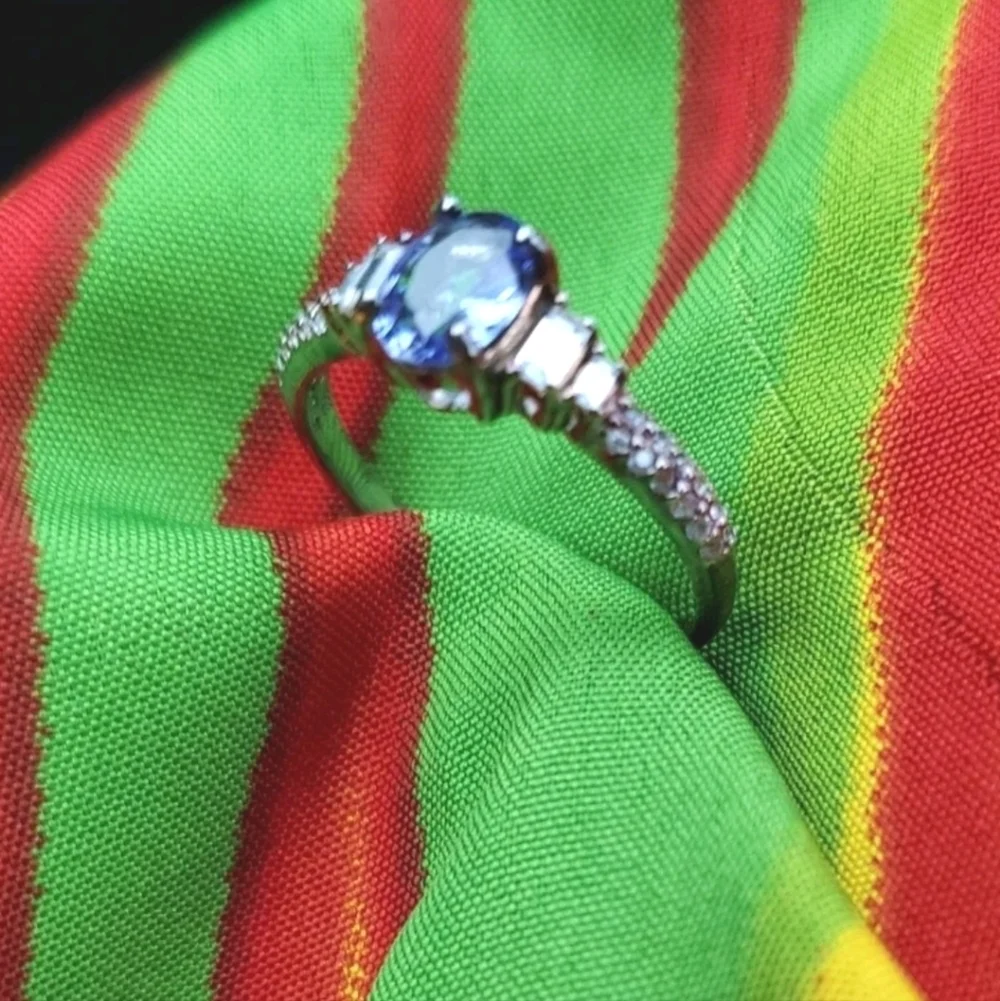 Genuine Tanzanite & Zircon Solitaire ring in Platinum Plated Sterling Silver